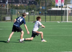 Youth players competing on the field