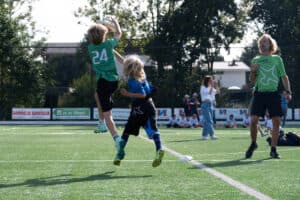 Young players battling for the disc