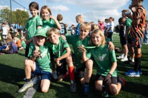 A team posing together after the games