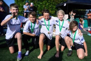 Players celebrating together with their medals